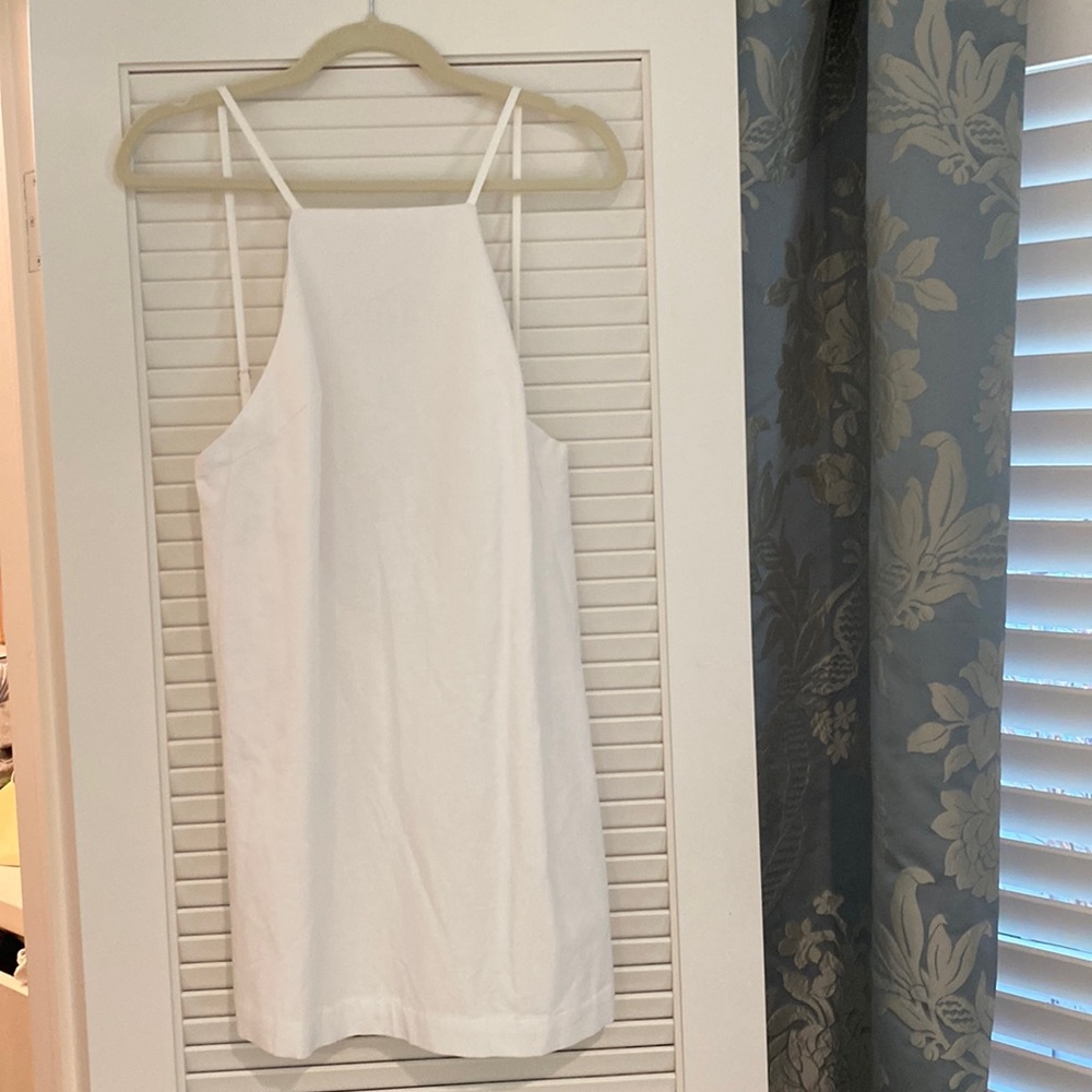 Short backless white dress, never worn
